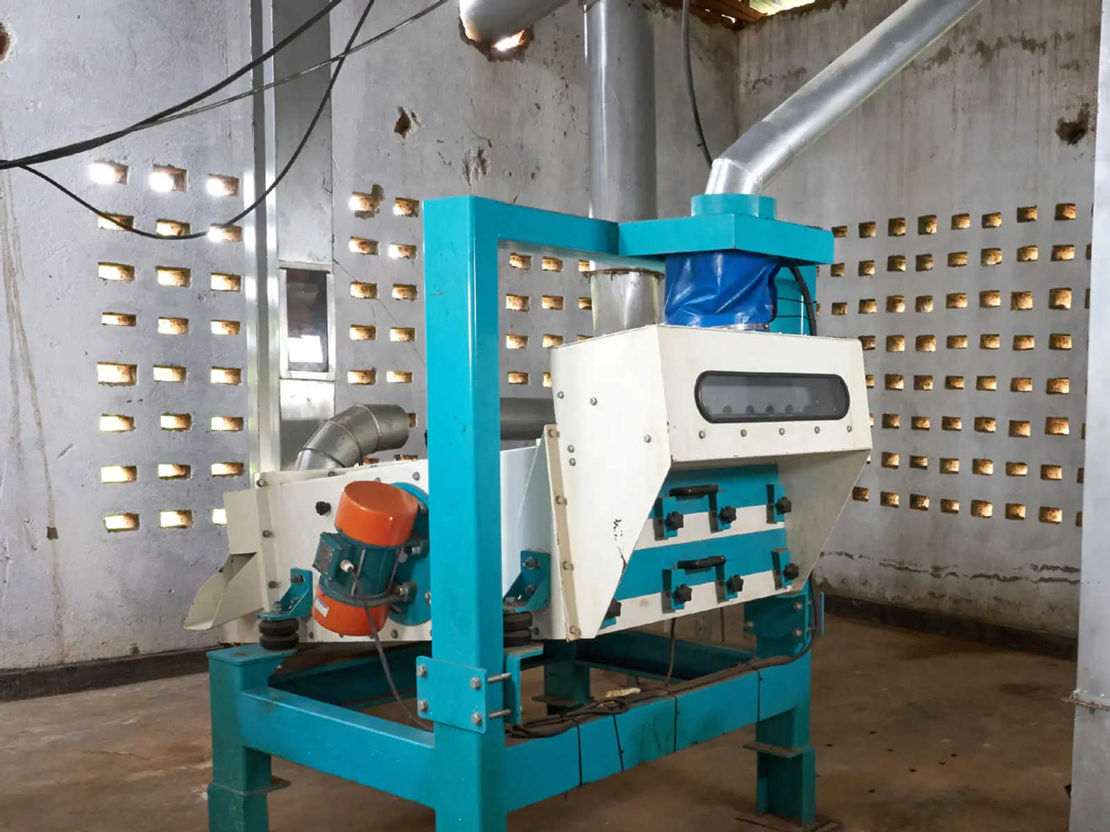 Grain cleaning machinery at the milling plant